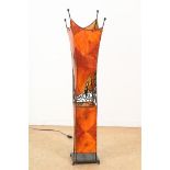 Iron table lamp covered with leather, West Africa, height 110 cm.