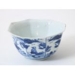 Octagonal porcelain bowl, decorated in blue with figures in landscape, China transitional
