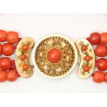 4-row red coral bead necklace with cheese and barrel beads on a gold filigree decorated regional