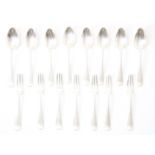 silver cutlery: 7 small forks and 8 small spoons