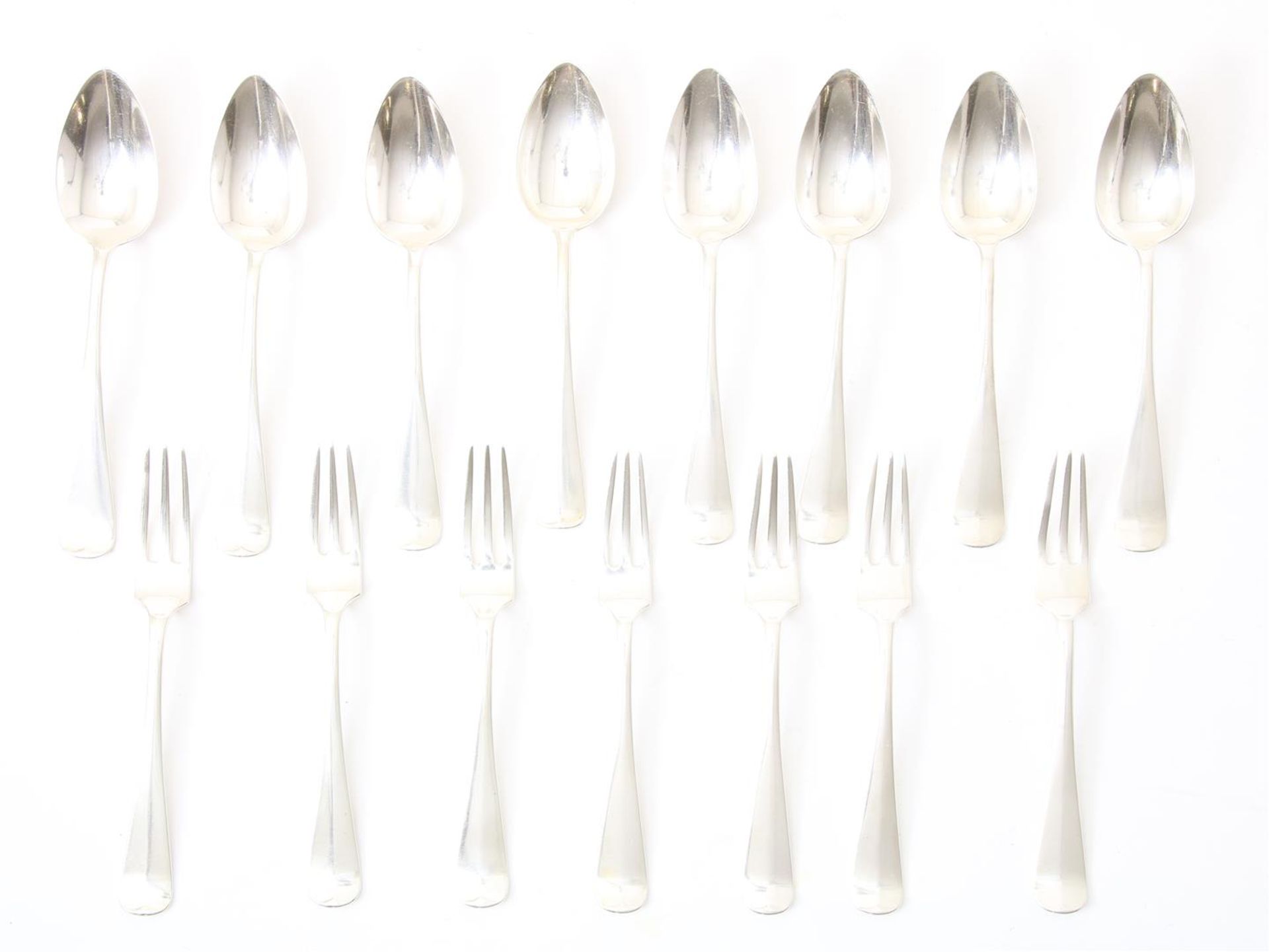 silver cutlery: 7 small forks and 8 small spoons