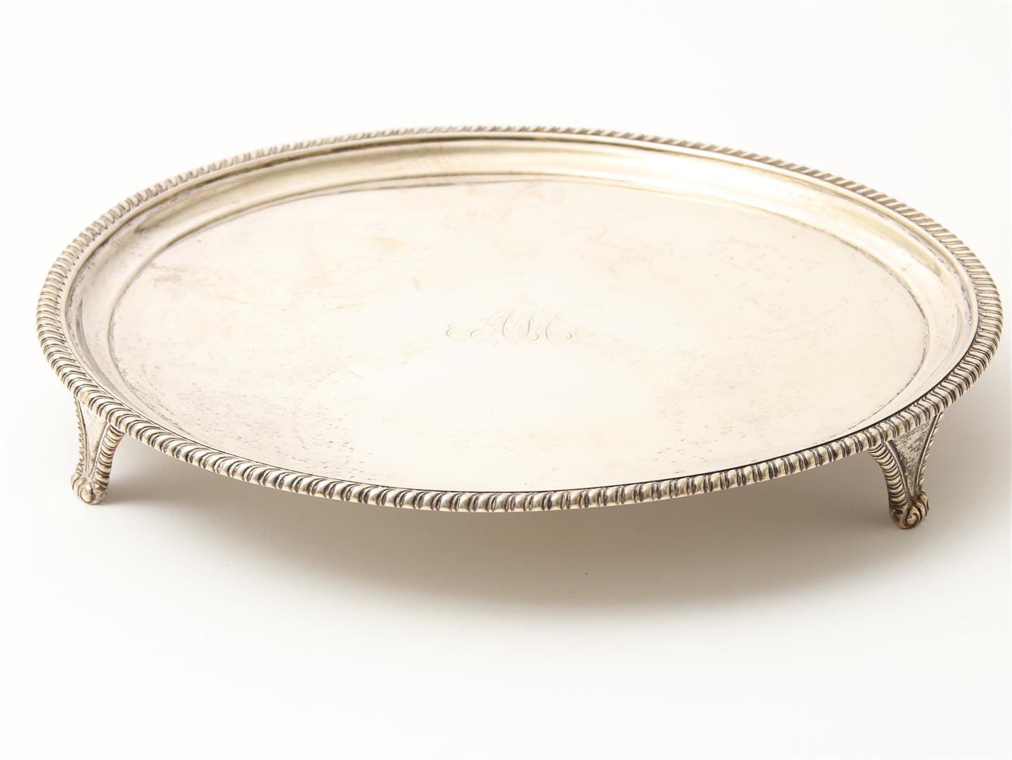 Silver round Georgian tray with ribbed edge on 3 curly legs, England, London, year letter "o", 1789,