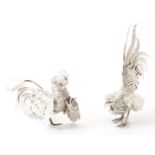 A pair of silver cockrells