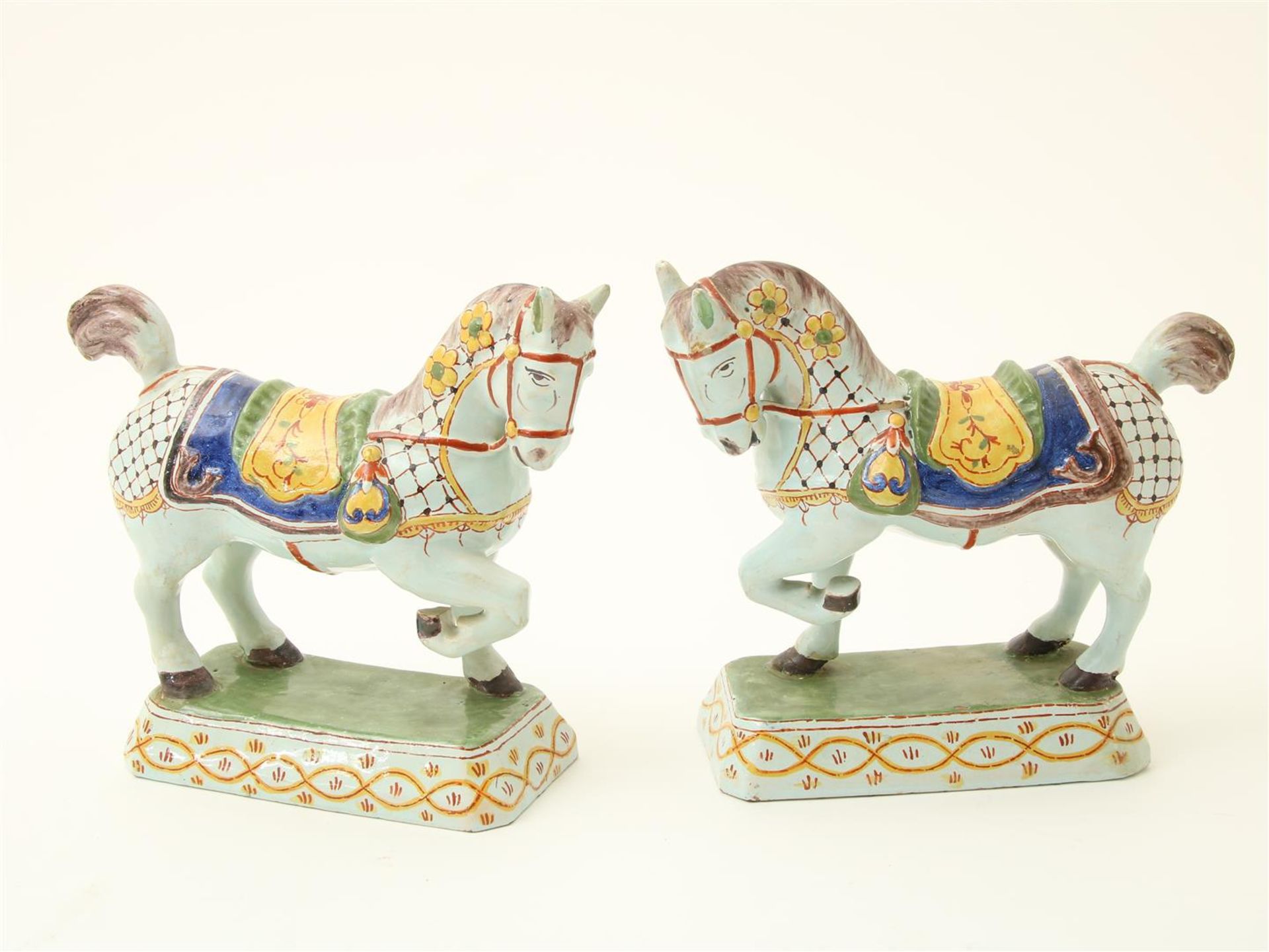 ornamental horses on base,