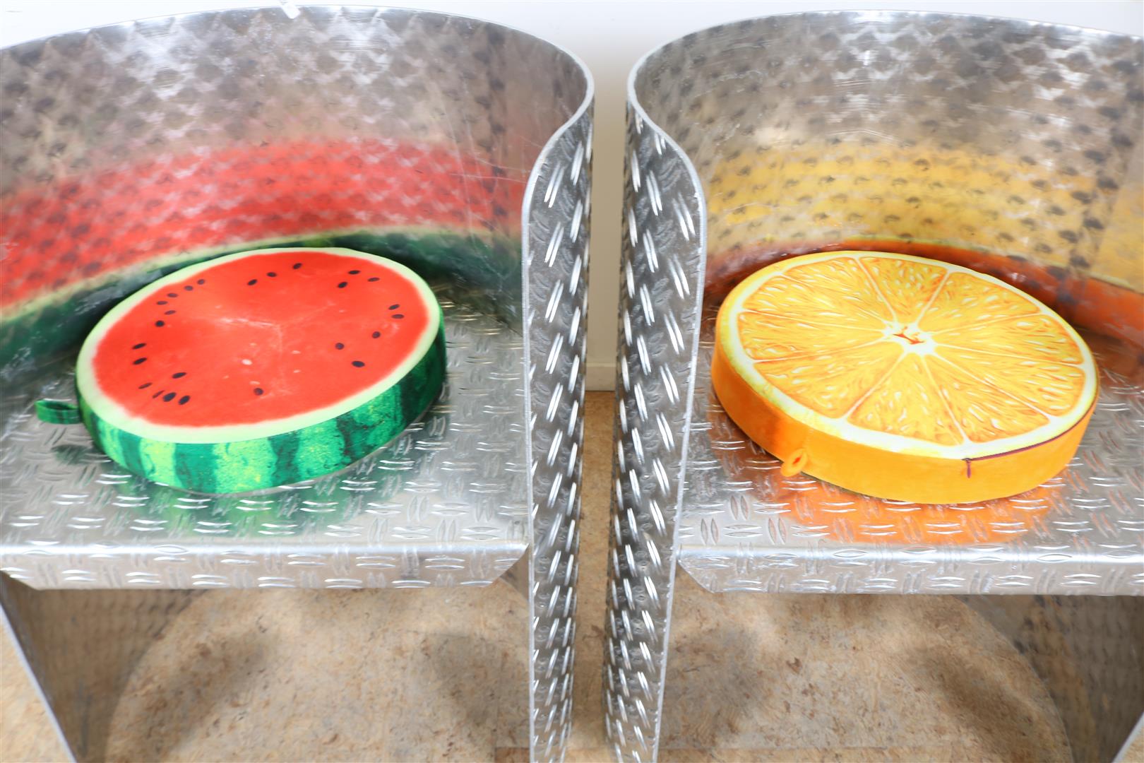 Set of cylindrical aluminum diamond plate design bucket seats with fabric fruit cushions. - Image 4 of 4