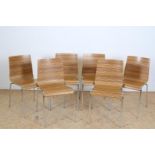 Series of 6 plywood laminated curved zebra wood design chairs on tubular frame base, designer Emilio