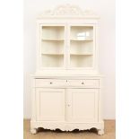 Painted white Biedermeier bonheur with carved crest, 2 glass doors, a drawer and 2 panel doors, 19th
