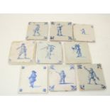 Lot of 9 various earthenware blue-white tiles, decorated with soldiers, corner motif of ox head