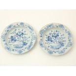 Set of porcelain plates decorated with landscapes with flowers and a contoured edge, China 18th