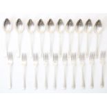 Series of 10 large cutlery pieces, spoons and forks, double fillet, grade 835/000..