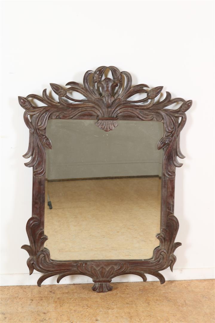 Wooden Art Nouveau mirror decorated with leaf ornaments and cut mirror, marked on the back with