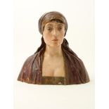 bust of a lady with headscarf