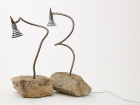 Two designer lamps on quartz base