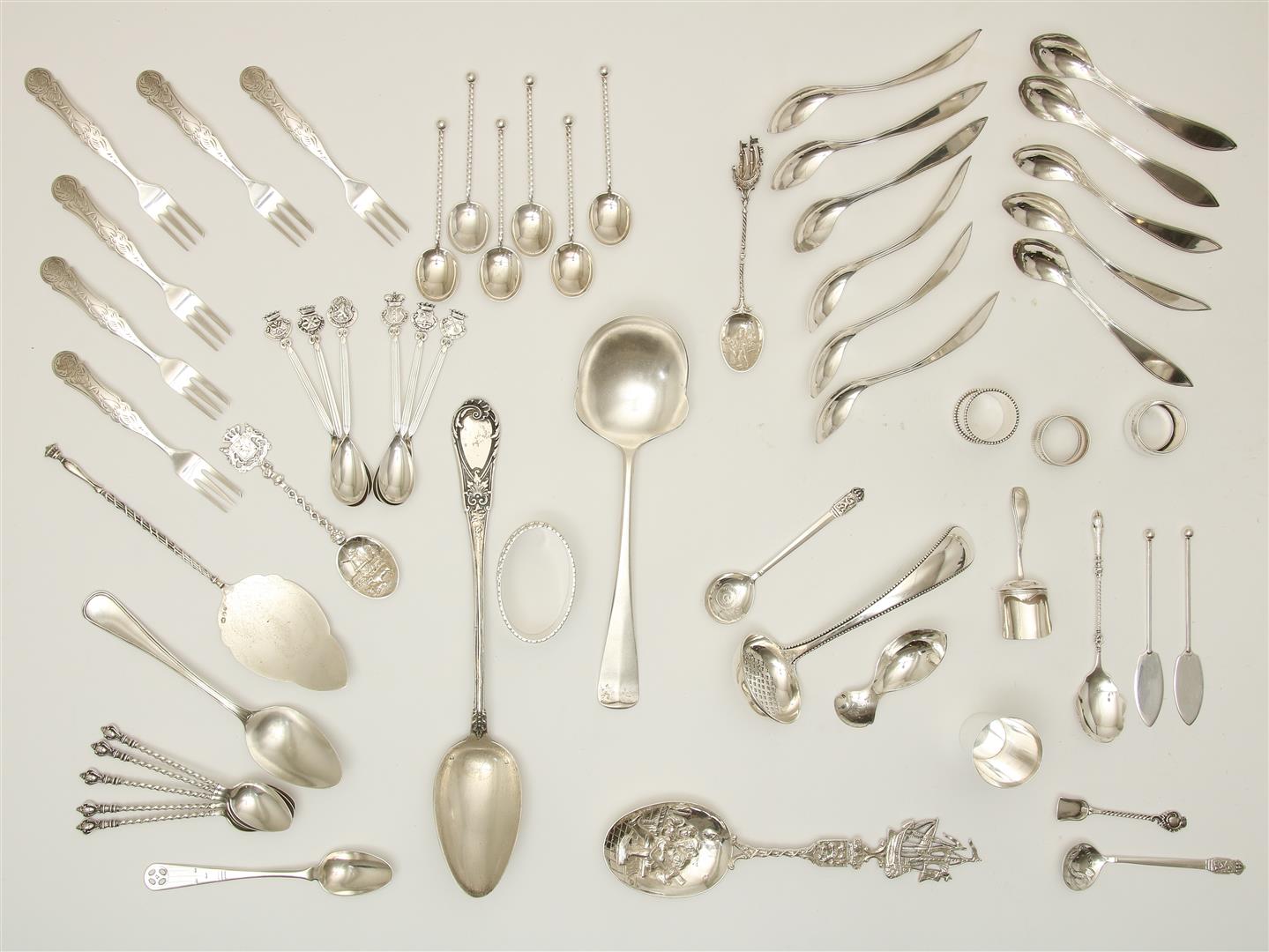 Various silver, including a potato spoon, a wet fruit scoop, various teaspoons, birth spoon and