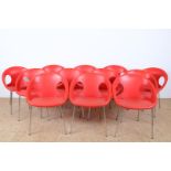 Series of 12 red plastic bucket chairs on chrome legs, marked on the bottom Drop Scab, design