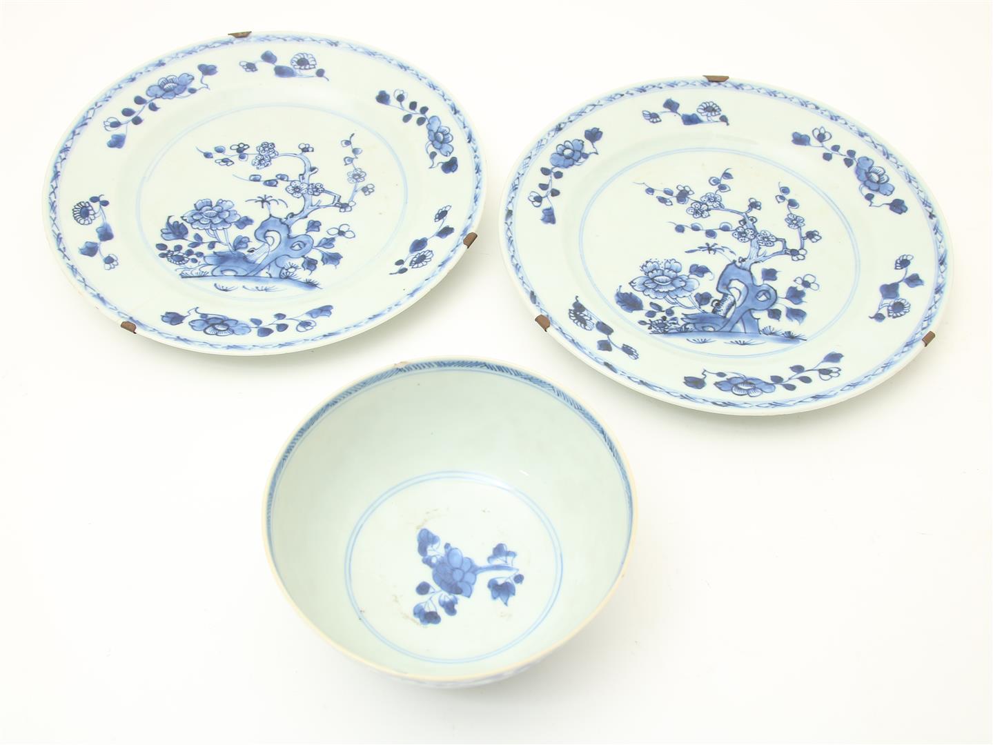 Set porcelain plates, decorated in blue with flowering shrubs, China 18th centur