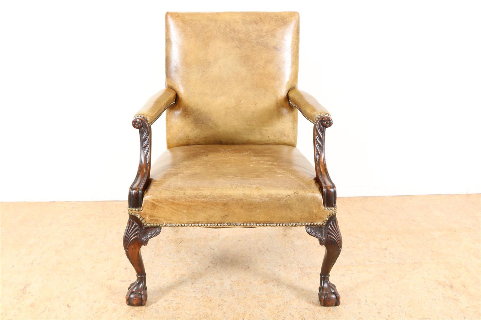 Brown leather armchair