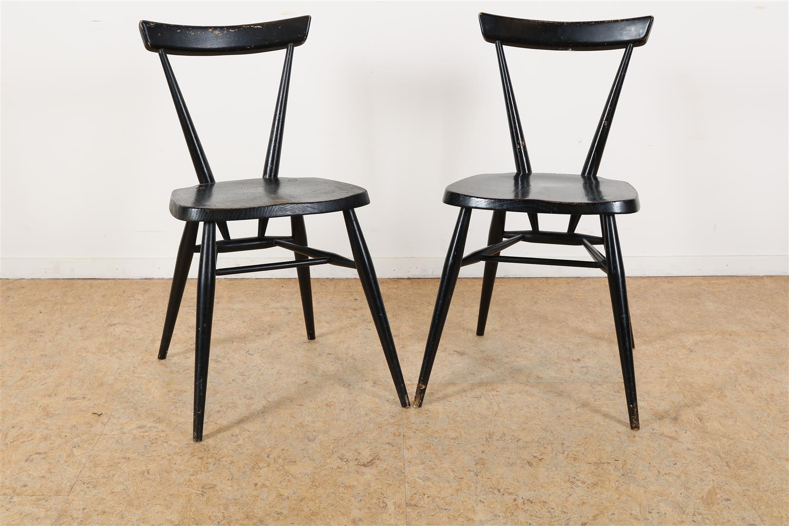Set of black stained Ercol chairs, England 1960s, stamped underside of seat, height 75 cm.
