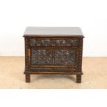 Oak document box with richly carved front panel of flowers, Germany, 43 x 50 x 33 cm.