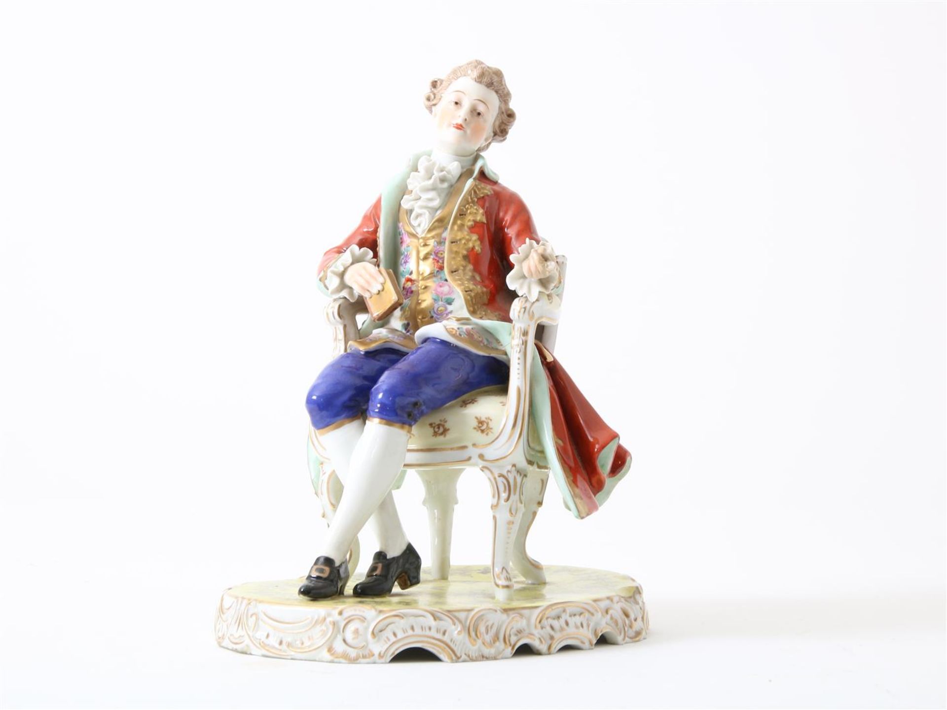 Porcelain sculpture of a seated 18th century gentleman in a chair, marked Sevres S, France 20th