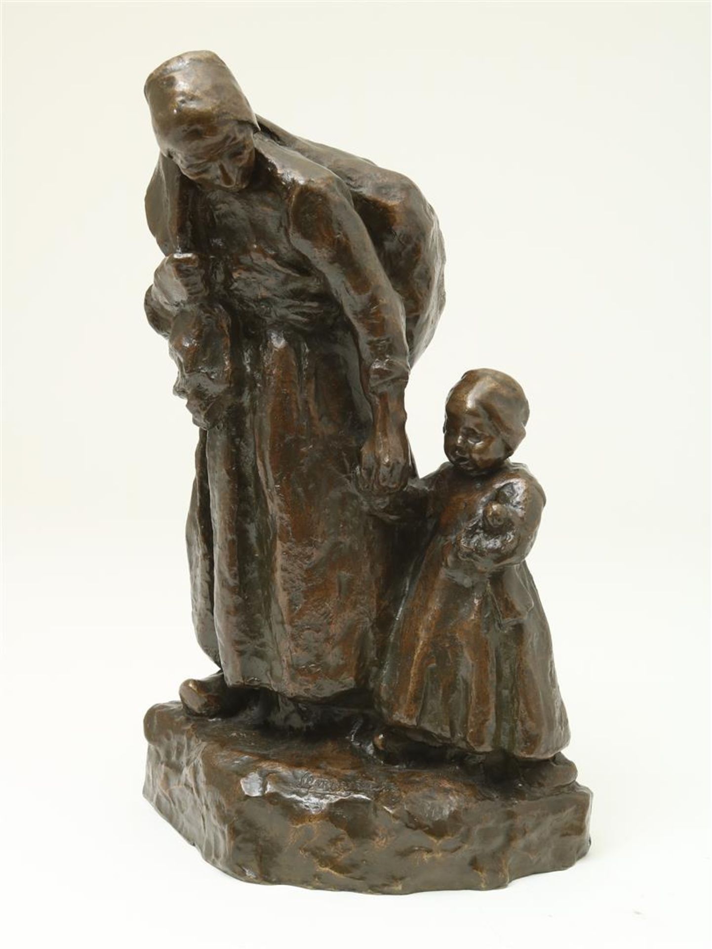 "Charles" Henri Marie van Wijk (1875-1917) Bronze sculpture of a walking mother with a bag on her