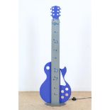 Metal design guitar with musical notes and lighting, height 128 cm.