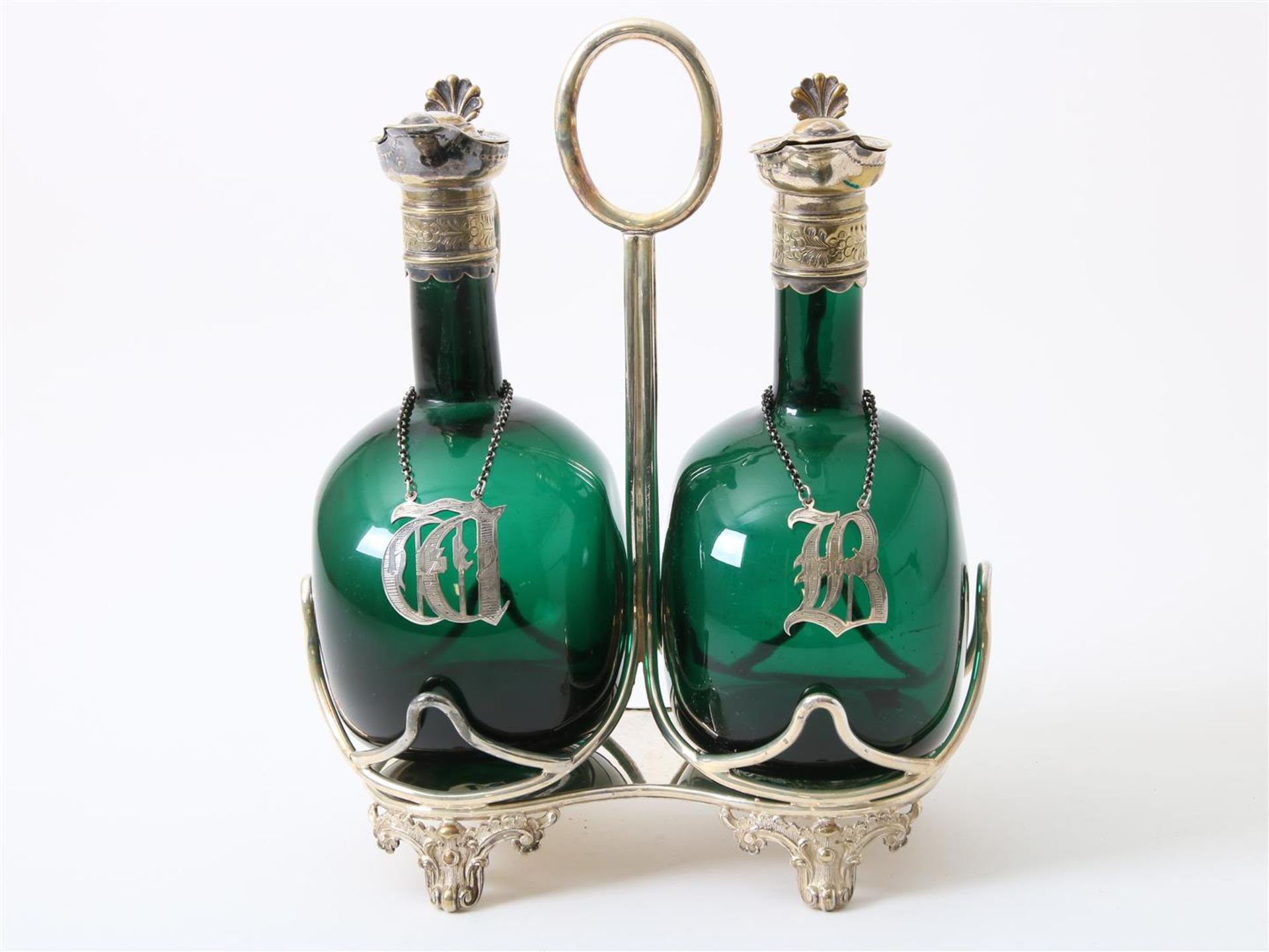 Decanter set, green glass convex belly decanters with plated lid frames in plated mounting. Bristol