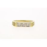 Yellow gold ring with diamonds in white gold setting