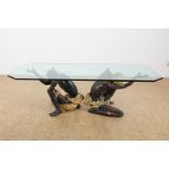 Glass coffee table supported by 2 polychrome painted wooden kneeling Moors, 50 x 160 x 80 cm.