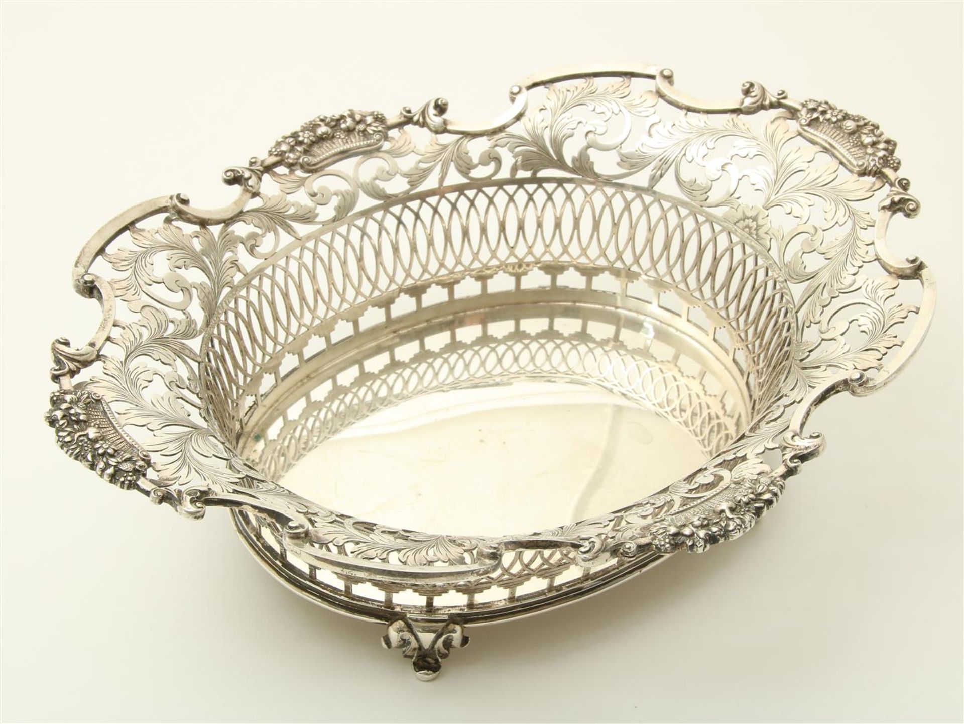 19th century silver engraved and openwork bread basket on legs