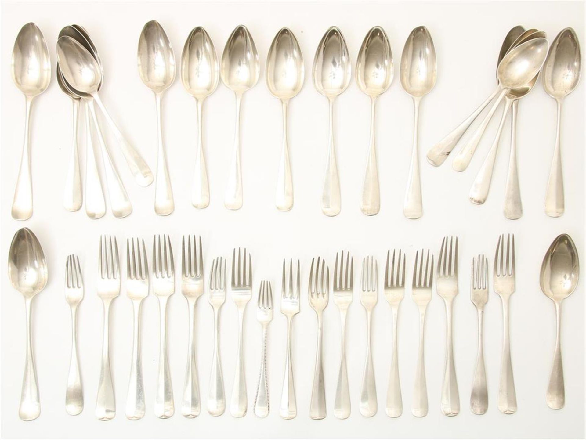 Lot of silver cutlery, including 19 various forks and 19 various spoons, gross weight 1789 grams.