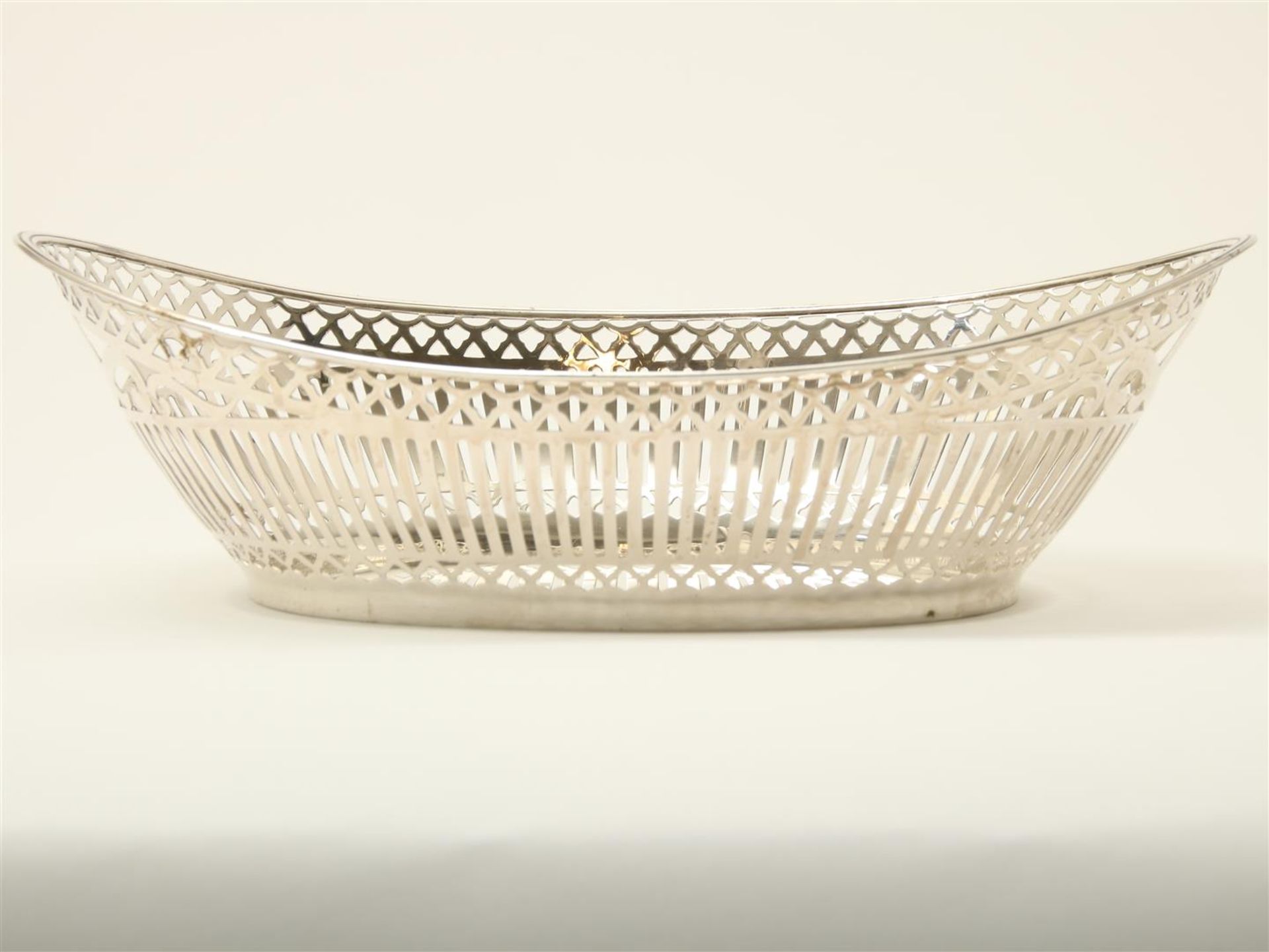 Openwork silver bread basket with bar motif, grade 835/000, maker's mark: "APz3", Fa. A. Pressburg &