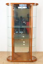 Walnut oval modern display cabinet