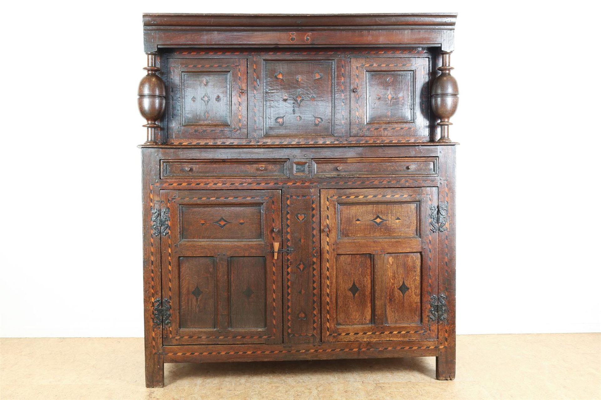 Oak sideboard, upper cabinet with straight hood and 2 panel doors inlaid with fruit wood supported