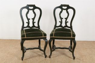 Two chairs, black lacquerwork and gold trimming