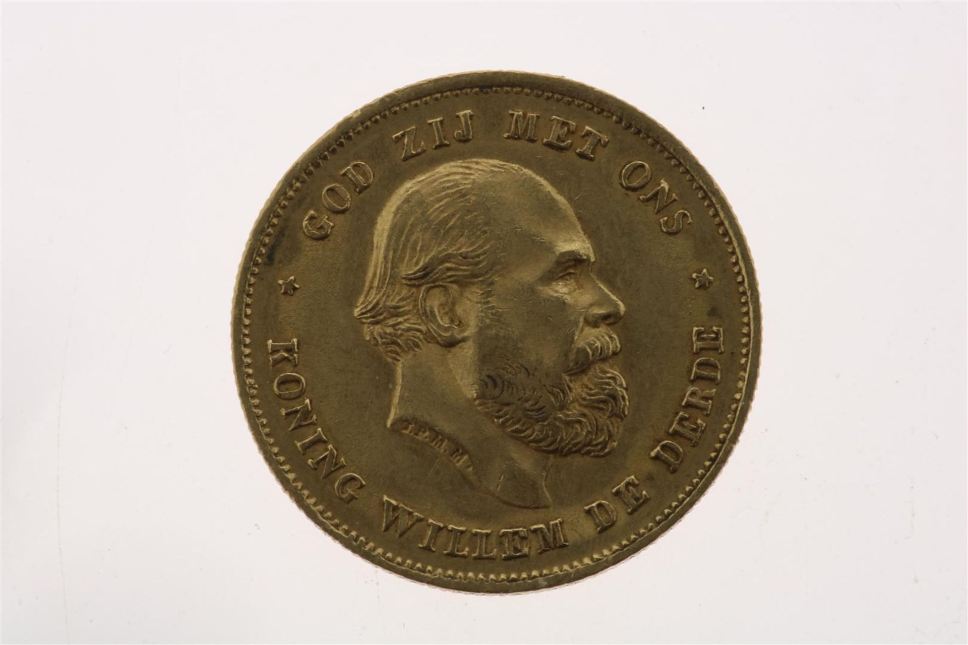 Gold tenner with image of Willem III, looking to the right, 1875, weight 6.72 grams.