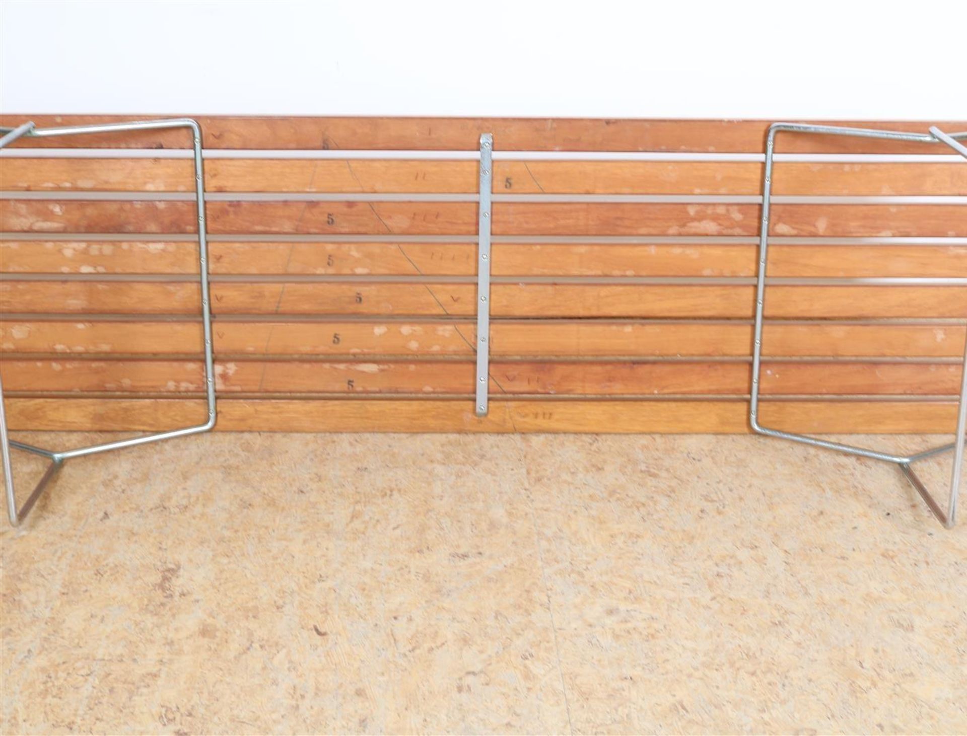 Design slatted bench with wooden oak seat on metal tubular frame legs, designed in 1952 by Harry - Image 4 of 4
