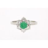 White gold ring with emerald and diamond, brilliant cut