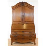 Oak Louis XVI writing cabinet, arched hood with carved ornaments, behind the flap an interior with
