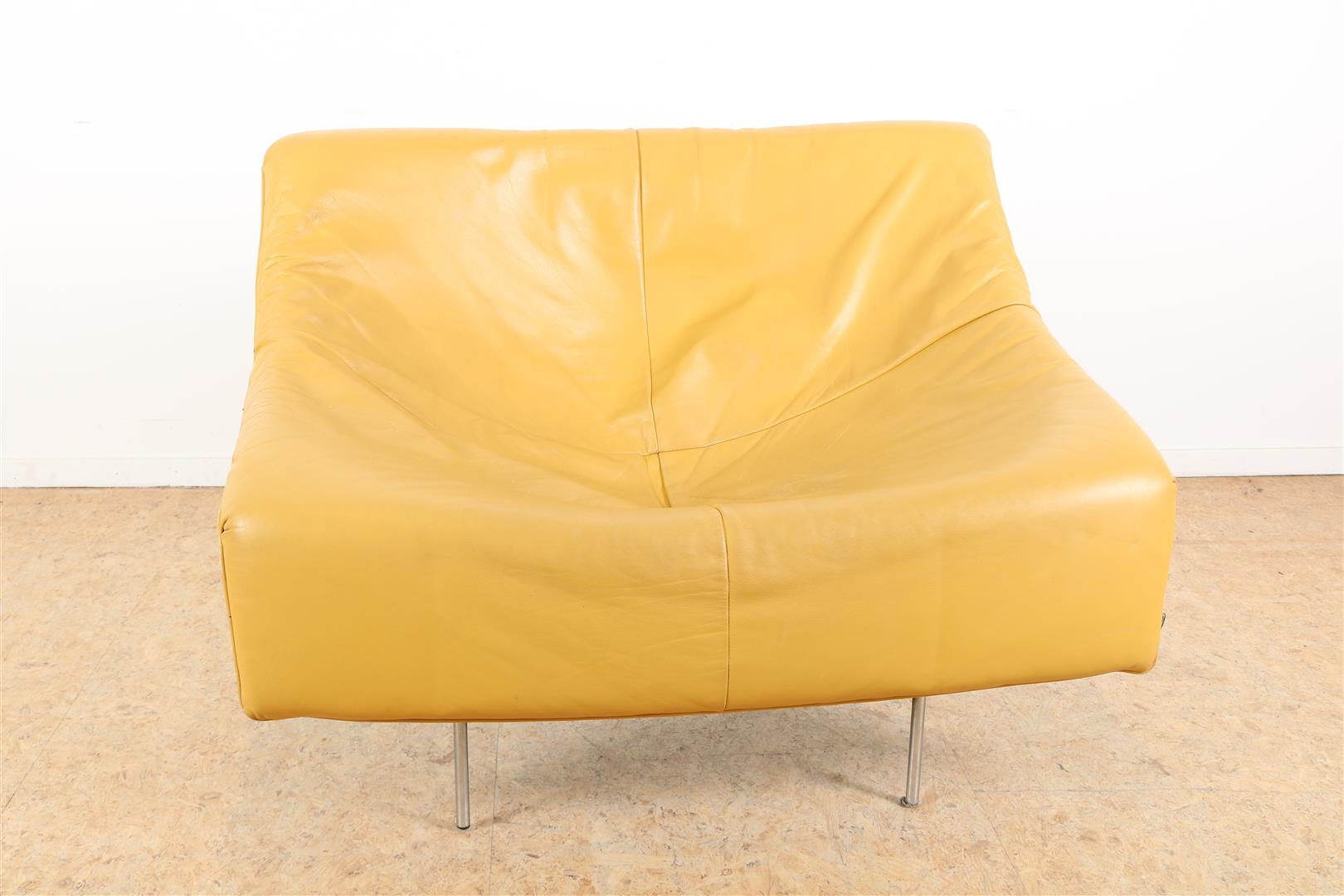 Chrome-plated design chair with yellow leather cushion, designer Gerard van den Berg for Montis,