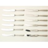 Series of 12 knives with silver ribbed handles, grade 835/000, Dutch small mark, gross weight 857