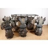 Series of 6 iron chairs made from engine parts and an iron table made from engine parts, "Aliens