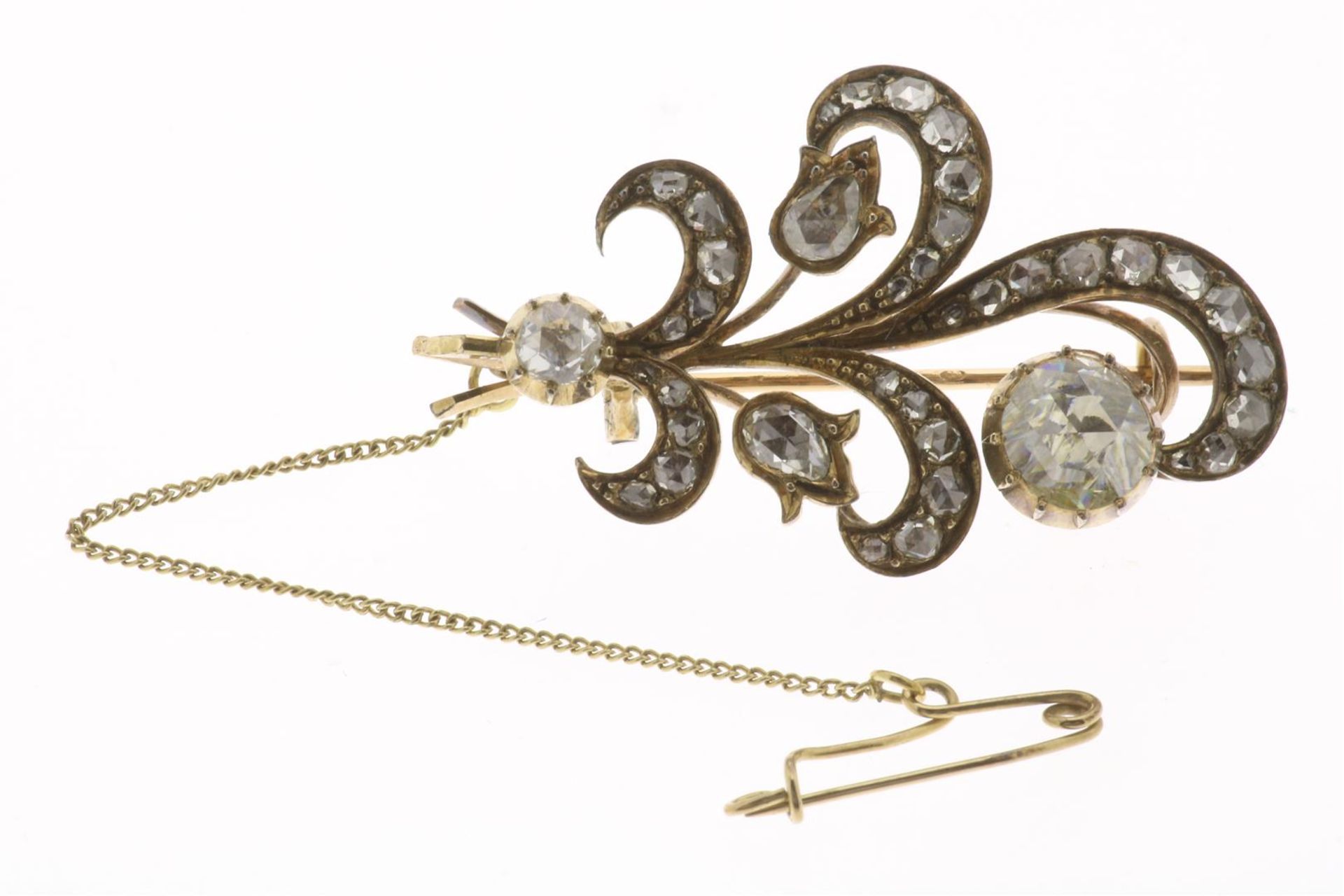 Yellow gold branch brooch, set with old cut diamonds set in silver, including 1x large Amsterdam