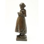 "Charles" Henri Marie van Wijk (1875-1917) Bronze sculpture of a girl in clogs with needlework,