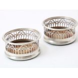 Set of silver Victorian openwork bottle trays with wooden bottom, England, Sheffield 1868, gross