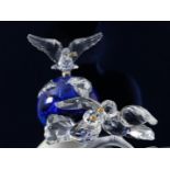 2 Swarovski crystal sculptures, Turtle Doves, 2004, system number: 7621/000/011, height 6 cm.;