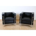 a pair of Corbusier-style fauteuils