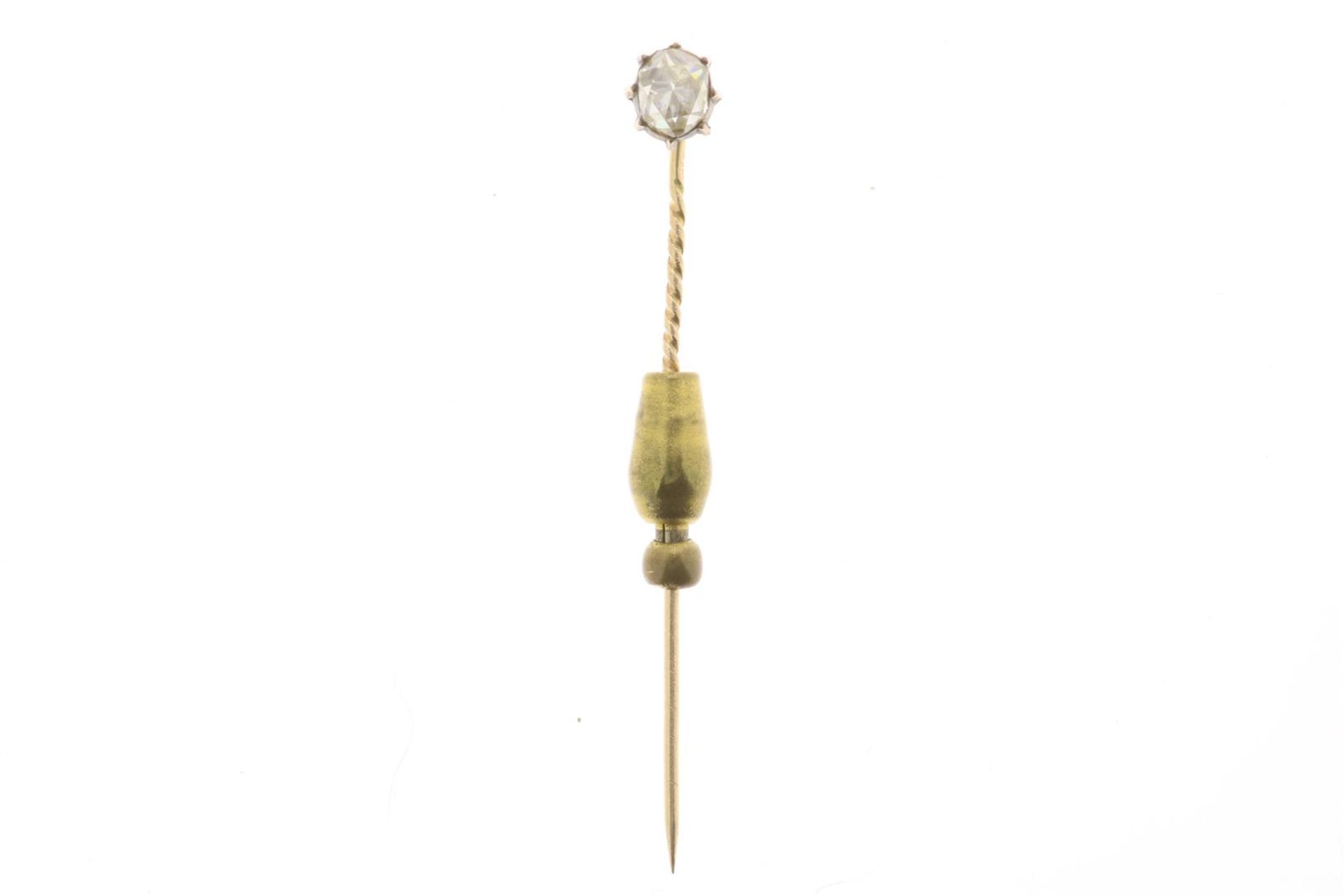 Gold tie pin set with diamonds, old cut, grade 585/000, gross weight 2.3 grams, length 6 cm.