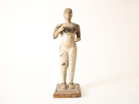 wooden sculpture of naked lady