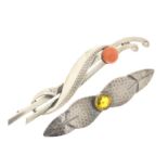 Lot of two silver brooches, one with red coral and one with citrine, grade 925/000, gross weight